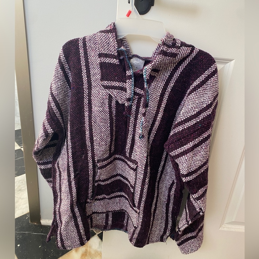 Purple “drug rug” sweater